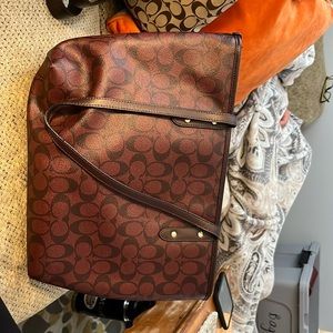 Plum signature Coach bag